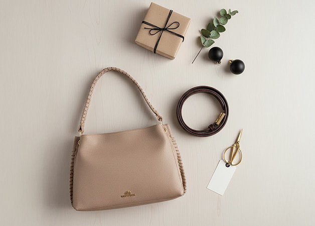 Шкіряна сумка через плече з плетеною ручкою