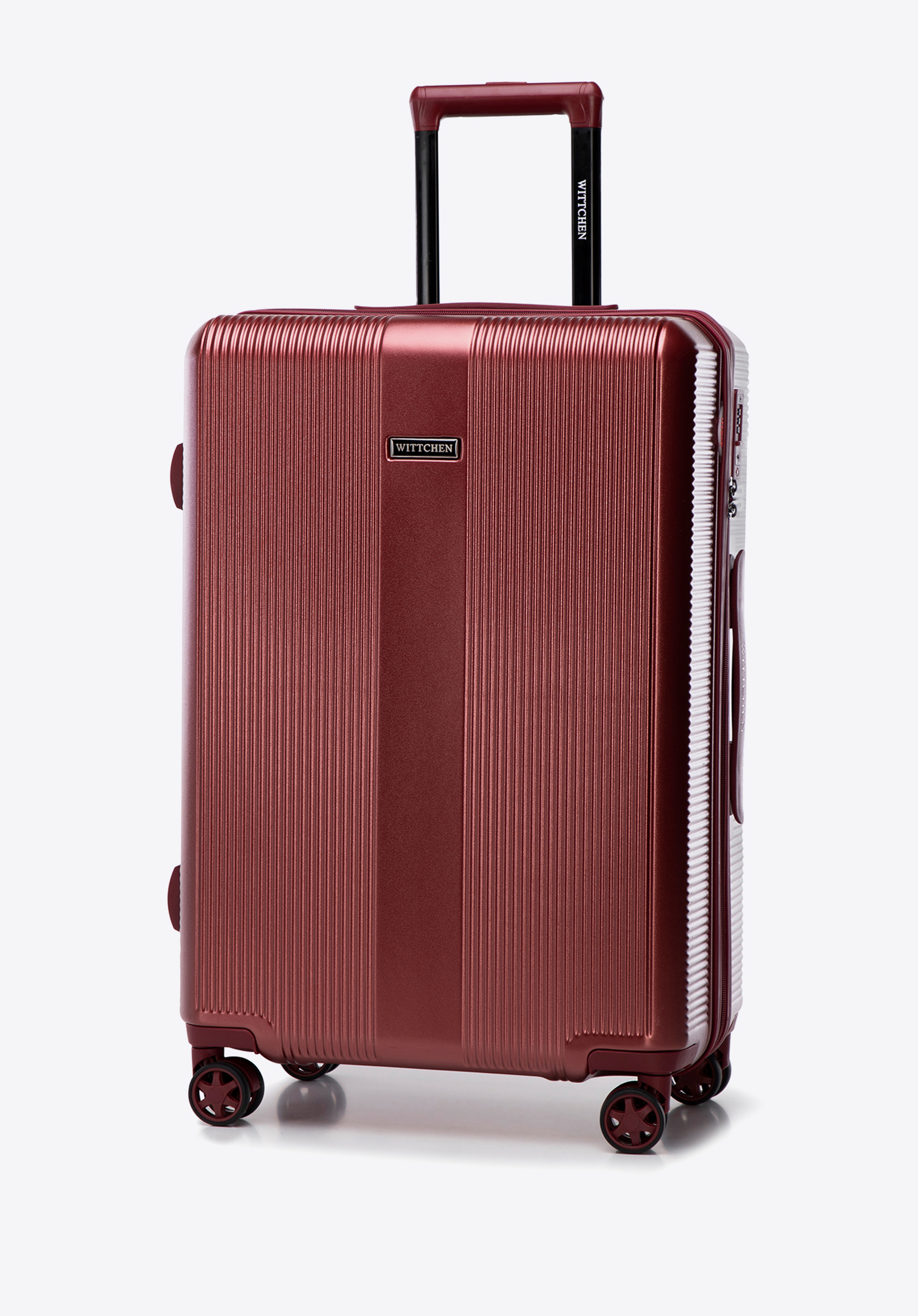 Середня валіза з полікарбонату з вертикальним тисненням