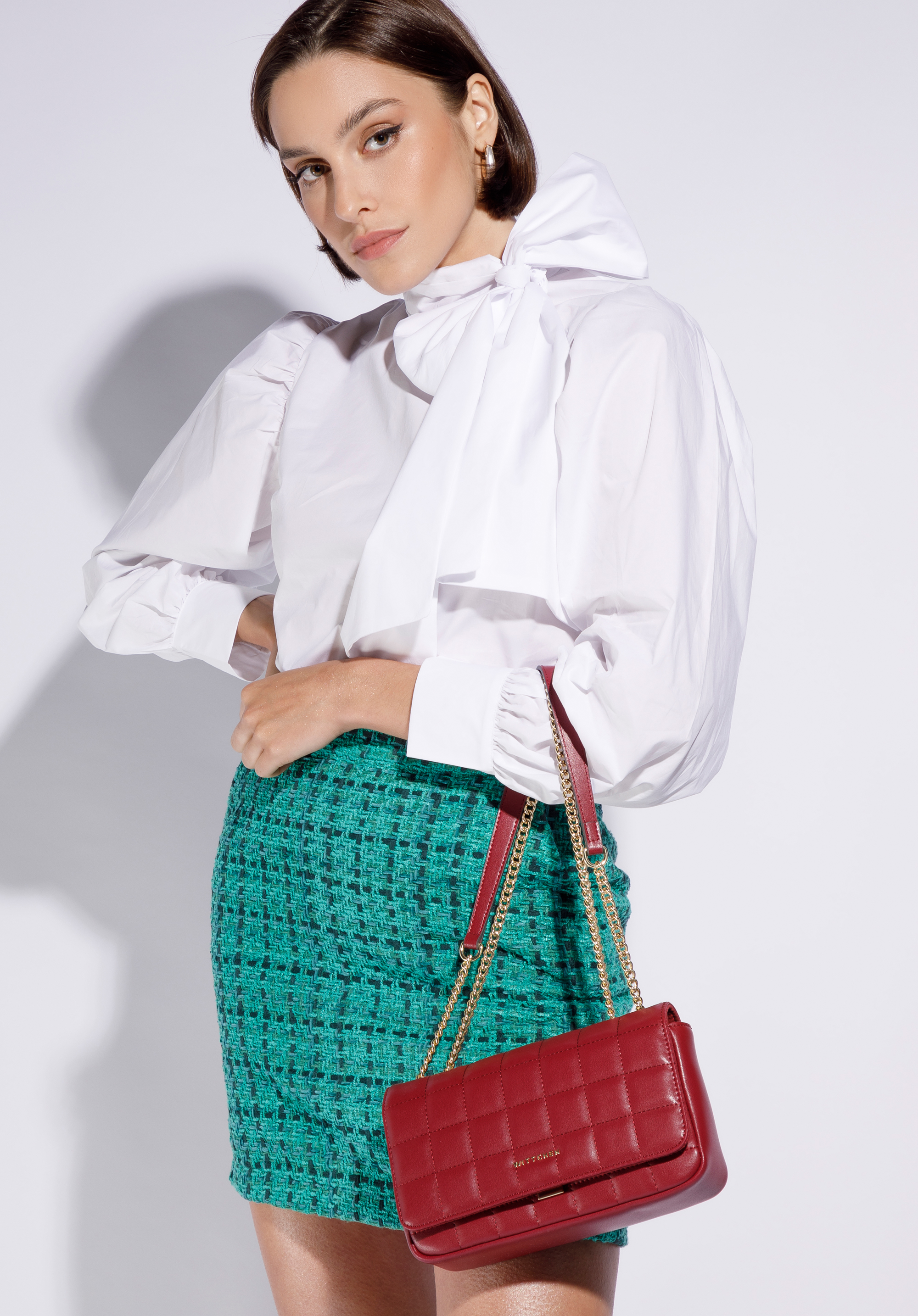 Längliche Handtasche aus gestepptem Leder für Damen