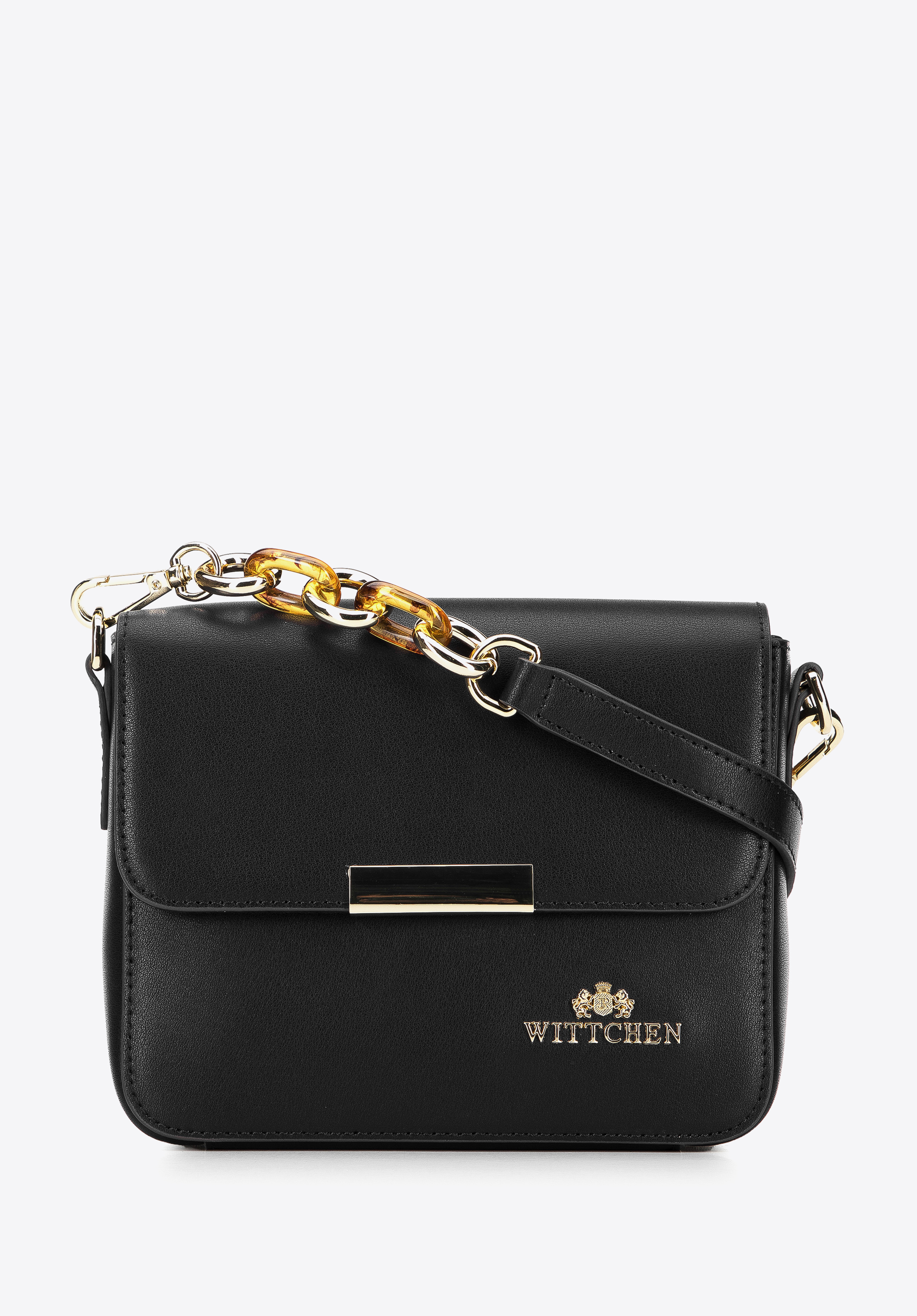 Damenhandtasche aus Leder an einem dekorativen Kette