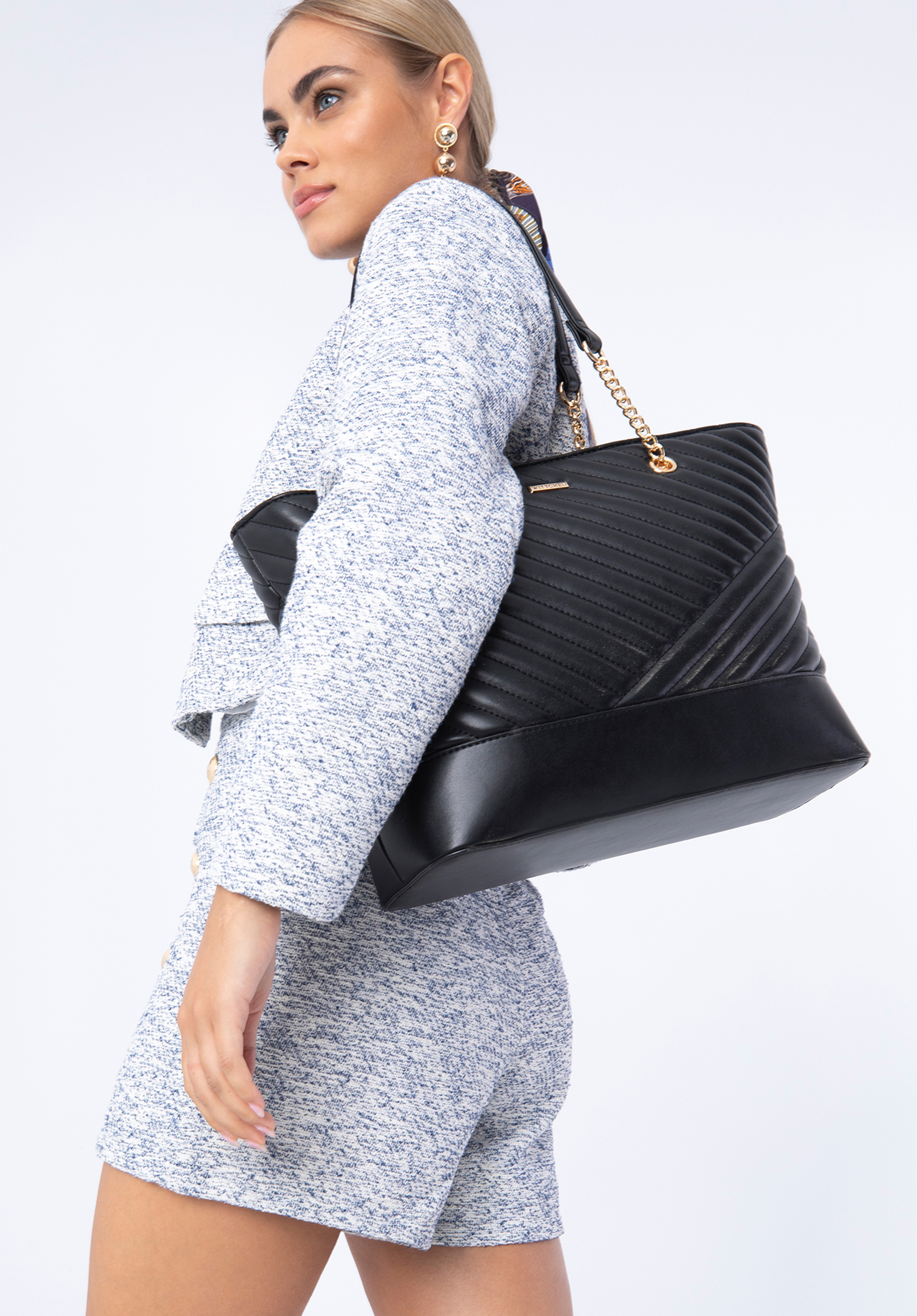 Gesteppte Shopper-Tasche aus Öko-Leder an einer Kette