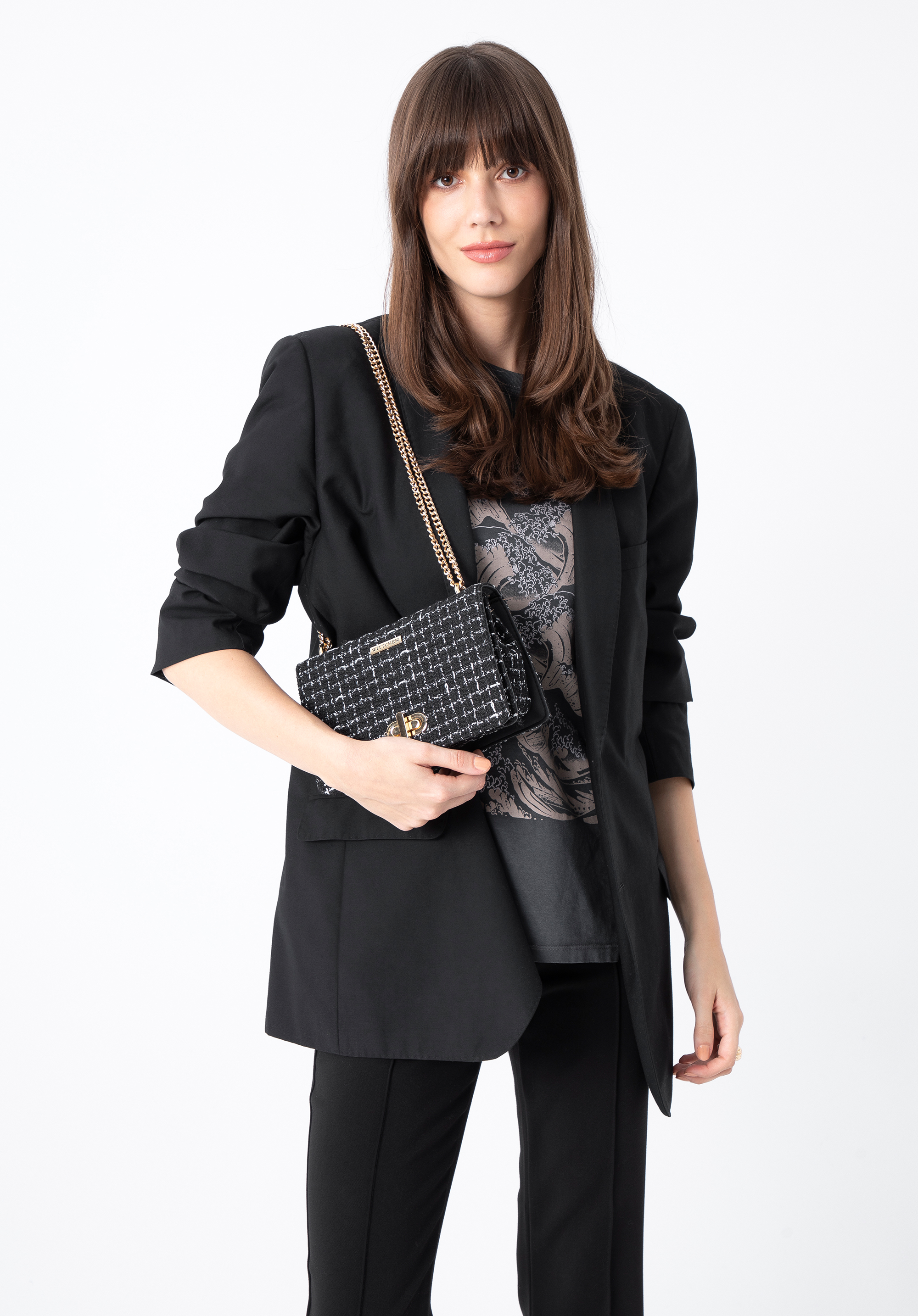 Kleine Damenhandtasche aus Bouclé mit Kettenschulterriemen
