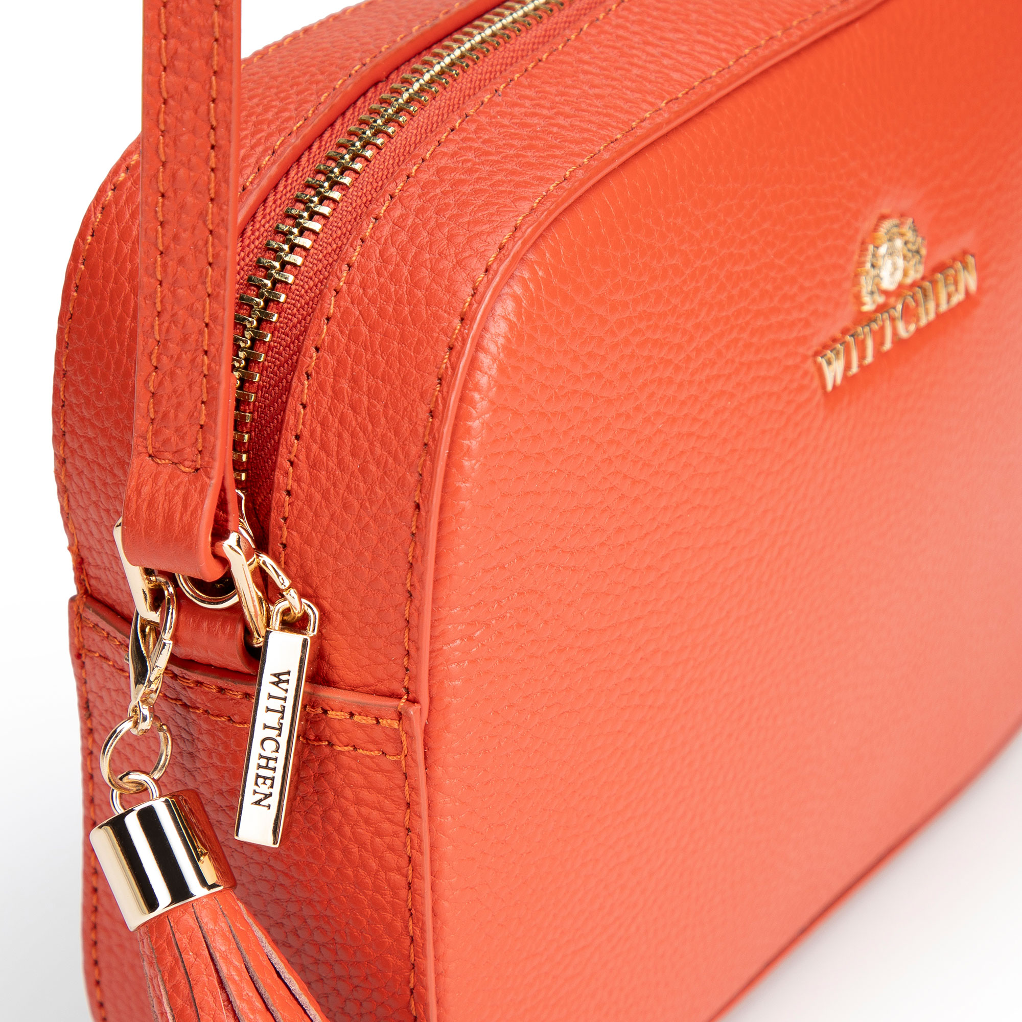 Dámska crossbody kabelka Wittchen z prírodnej kože s ozdobným strapcom a moderným vzhľadom, Vyberte variant oranžová