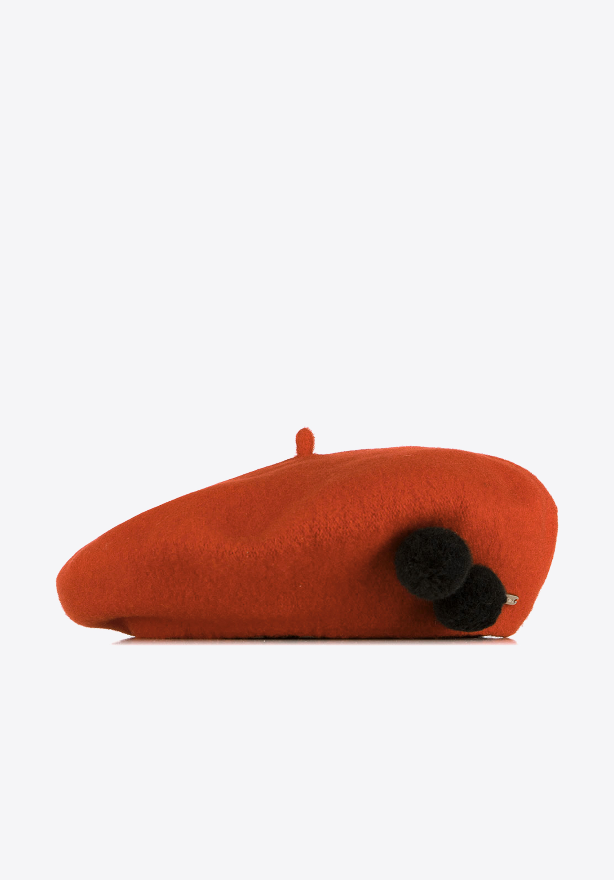 Damski beret wełniany z pomponami