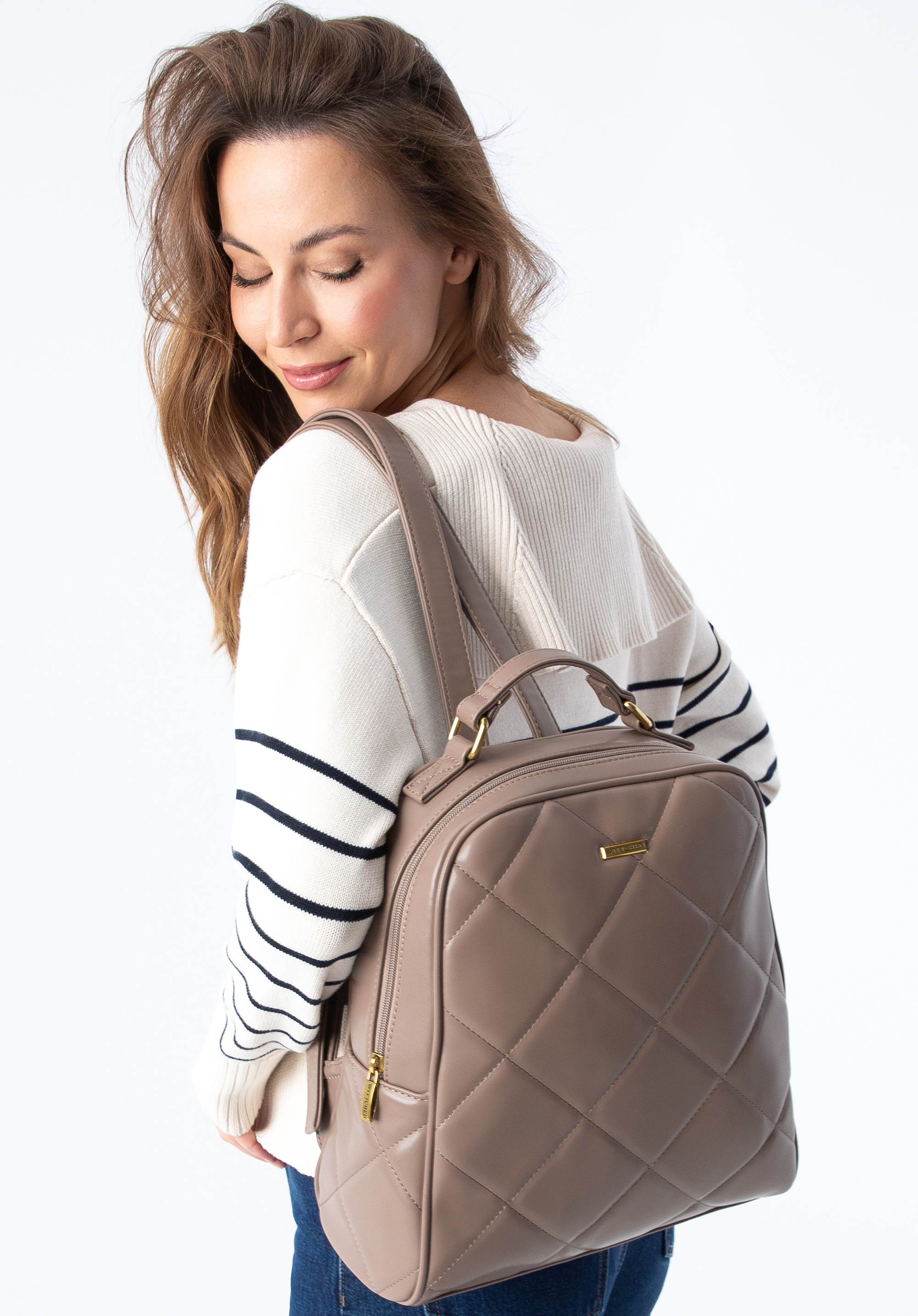 Quilted faux store leather backpack