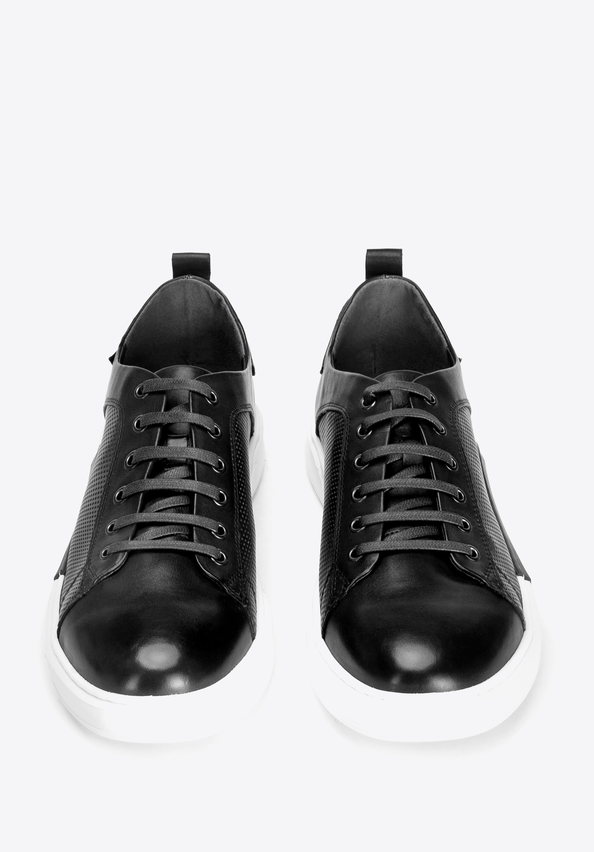 Black and white sole sales trainers