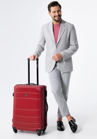 Średnia walizka z ABS-u żłobiona czerwona