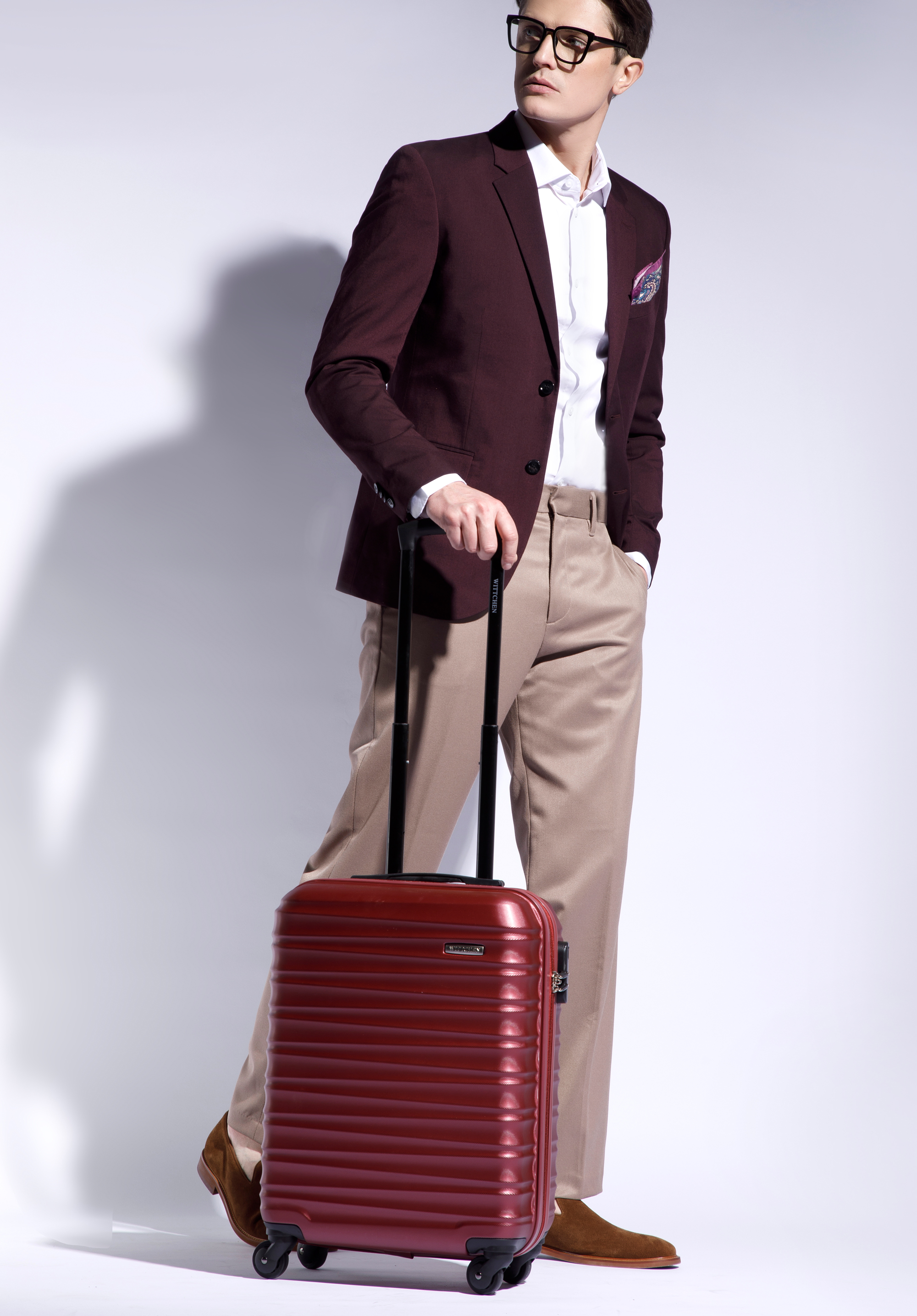 Small suitcase made of ABS material burgundy